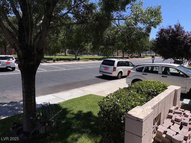 3447 One Nation Ave, Las Vegas, NV 89121 - view of asphalt road featuring sidewalks