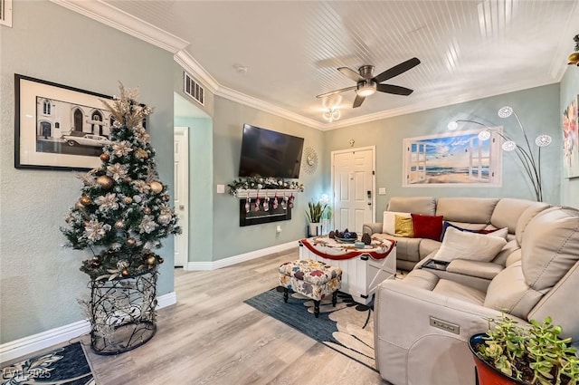 830 Carnegie St Unit 512, Henderson, NV 89052 - living area with light wood-style flooring, ceiling fan, and ornamental molding