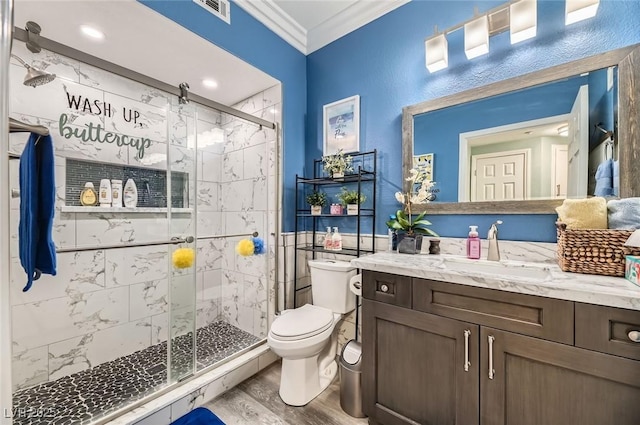 830 Carnegie St Unit 512, Henderson, NV 89052 - bathroom with ornamental molding, vanity, a stall shower, wood finished floors, and recessed lighting
