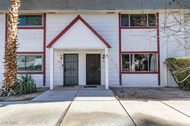225 Pecos Way, Las Vegas, NV 89121 - property entrance featuring a shingled roof