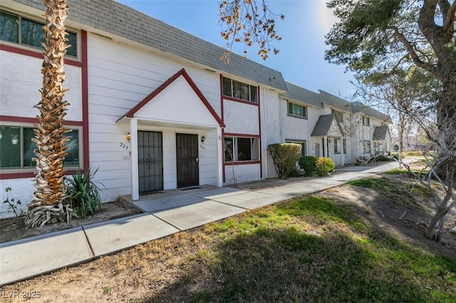 225 Pecos Way, Las Vegas, NV 89121 - view of front of property featuring a shingled roof and mansard roof