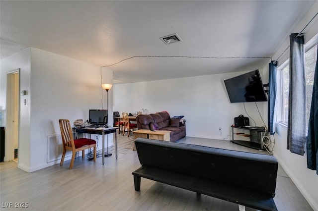 225 Pecos Way, Las Vegas, NV 89121 - living room featuring wood finished floors and a desk