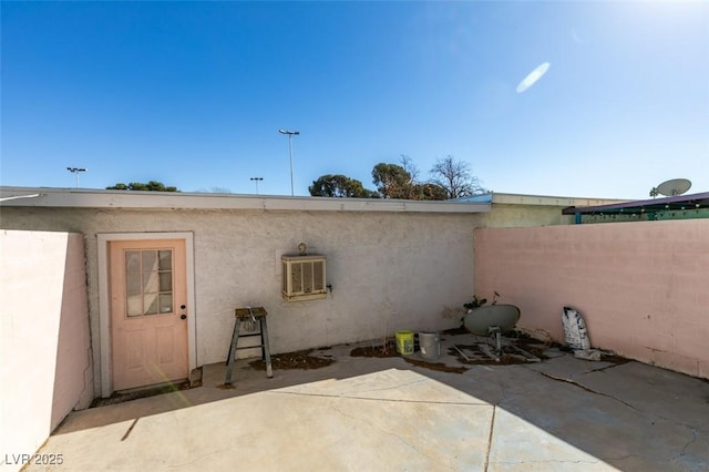 225 Pecos Way, Las Vegas, NV 89121 - view of patio with a wall mounted air conditioner