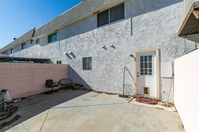 225 Pecos Way, Las Vegas, NV 89121 - fenced backyard featuring a patio