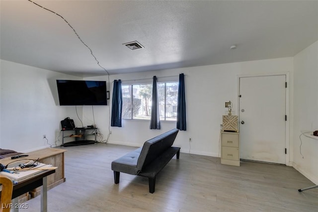 225 Pecos Way, Las Vegas, NV 89121 - living area with light wood-style flooring and baseboards