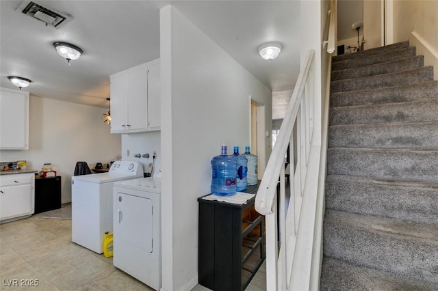 225 Pecos Way, Las Vegas, NV 89121 - washroom with washer and clothes dryer and cabinet space