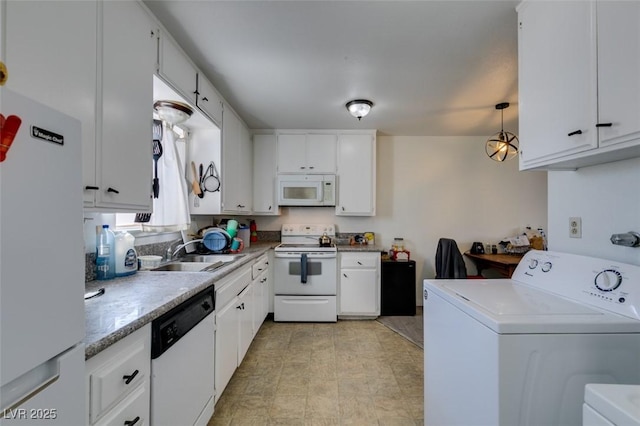 225 Pecos Way, Las Vegas, NV 89121 - kitchen featuring white appliances, white cabinetry, light countertops, washer and dryer, and decorative light fixtures