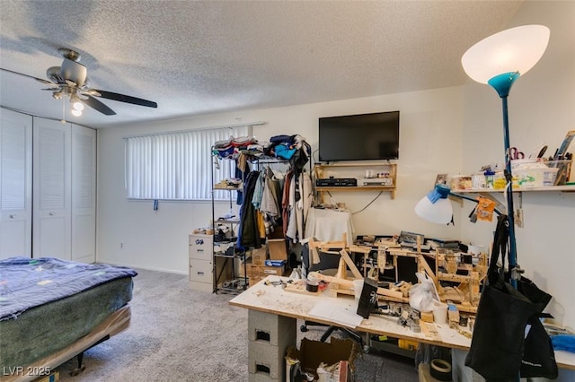 225 Pecos Way, Las Vegas, NV 89121 - carpeted bedroom featuring a textured ceiling, a workshop area, and a ceiling fan