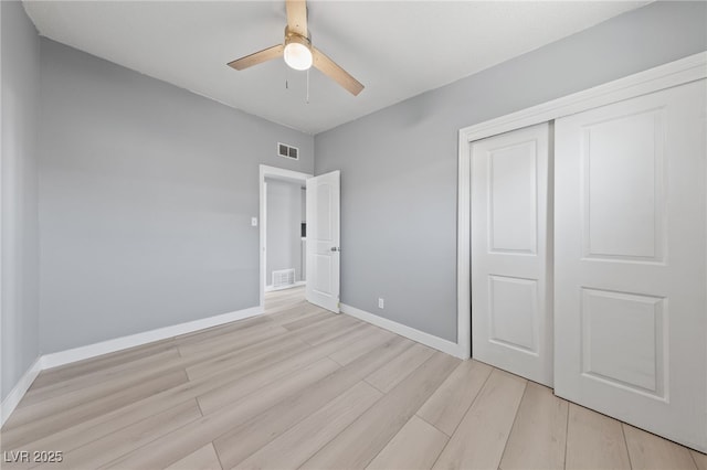 104 Stanford St, Las Vegas, NV 89107 - unfurnished bedroom featuring light wood-style flooring, a closet, and ceiling fan