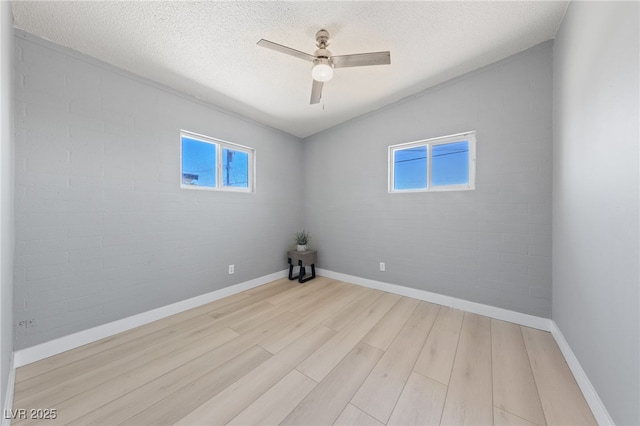 104 Stanford St, Las Vegas, NV 89107 - empty room featuring light wood-style floors, ceiling fan, and a textured ceiling