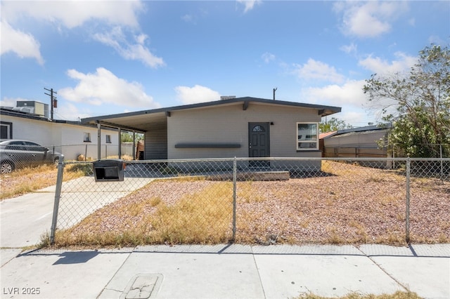 104 Stanford St, Las Vegas, NV 89107 - view of front facade featuring an attached carport and driveway
