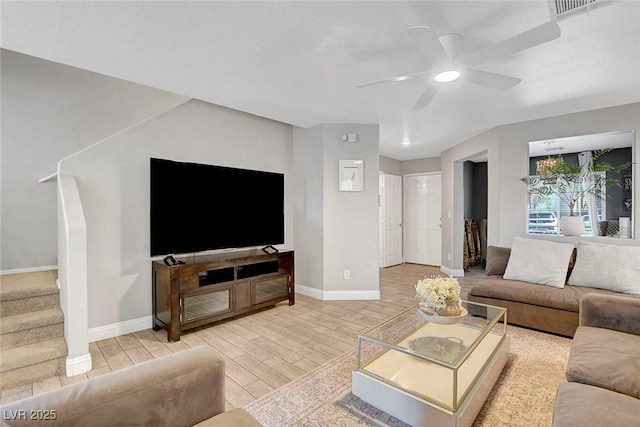 554 Haunts Walk Ave, Las Vegas, NV 89178 - living room with wood tiled floors, ceiling fan, and stairs
