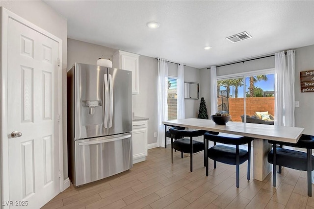 554 Haunts Walk Ave, Las Vegas, NV 89178 - dining area featuring light wood-type flooring and recessed lighting