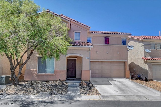 554 Haunts Walk Ave, Las Vegas, NV 89178 - mediterranean / spanish home featuring a tiled roof, an attached garage, driveway, and stucco siding