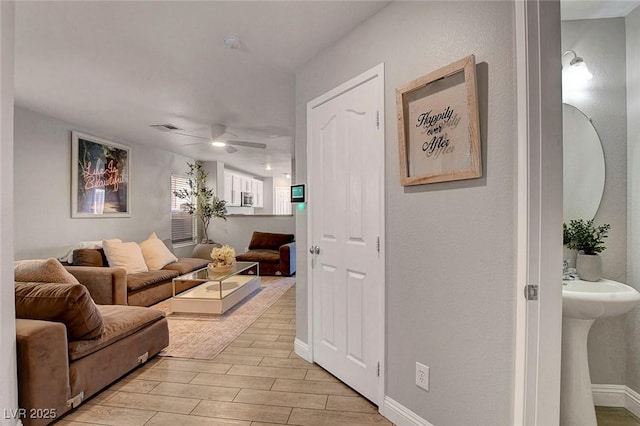554 Haunts Walk Ave, Las Vegas, NV 89178 - living room with light wood finished floors and a ceiling fan