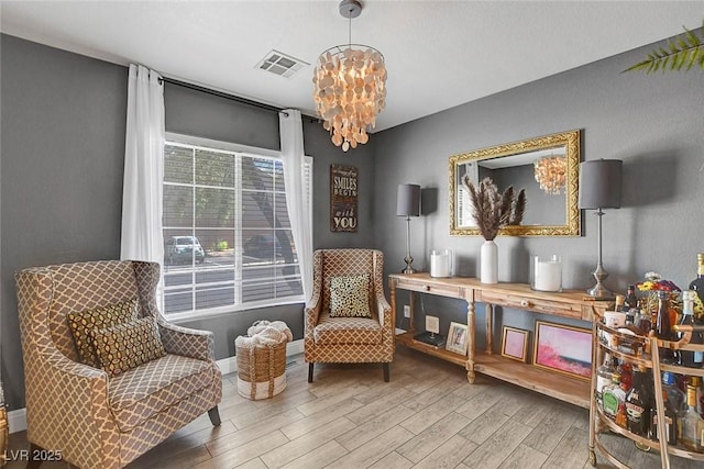 554 Haunts Walk Ave, Las Vegas, NV 89178 - living area with wood finished floors and a chandelier