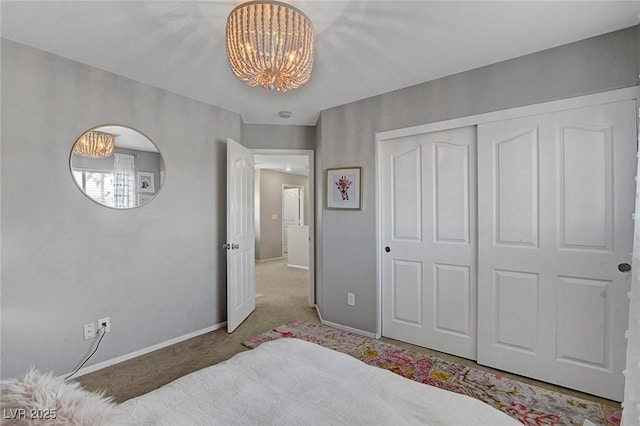 554 Haunts Walk Ave, Las Vegas, NV 89178 - bedroom with a chandelier, carpet, and a closet