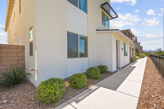 3058 Casarano Ct, Henderson, NV 89044 - view of property exterior with stucco siding and a residential view