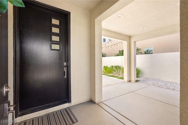3058 Casarano Ct, Henderson, NV 89044 - doorway to property with a patio area and stucco siding