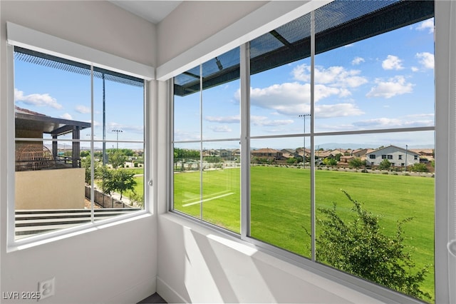 3058 Casarano Ct, Henderson, NV 89044 - unfurnished sunroom with healthy amount of natural light and a residential view