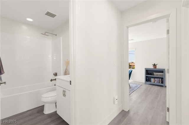 3058 Casarano Ct, Henderson, NV 89044 - bathroom with wood finished floors, shower / bath combination, and vanity