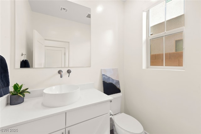 3058 Casarano Ct, Henderson, NV 89044 - bathroom featuring toilet and vanity