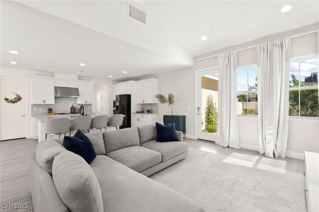 3058 Casarano Ct, Henderson, NV 89044 - living area with light wood finished floors and recessed lighting