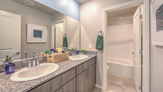 9968 Scarlet Hills St Unit 183, Las Vegas, NV 89141 - bathroom with double vanity and shower / washtub combination