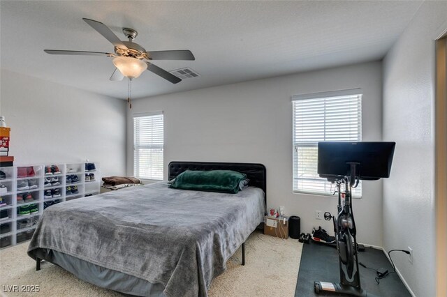 8733 Autumn Teal Ave, Las Vegas, NV 89178 - carpeted bedroom with a ceiling fan