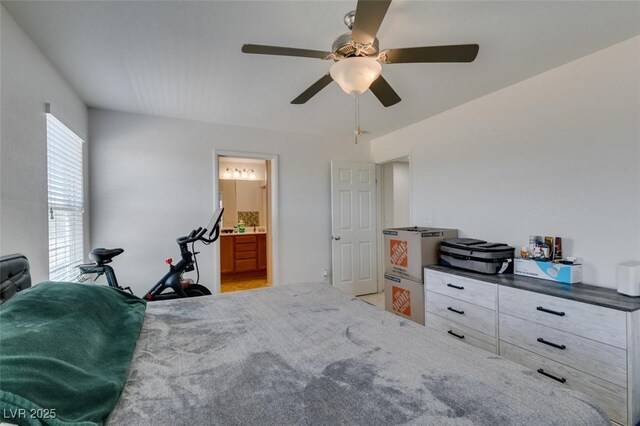 8733 Autumn Teal Ave, Las Vegas, NV 89178 - bedroom with ceiling fan and ensuite bathroom
