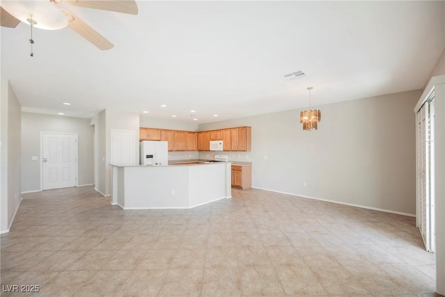 3405 Kingbird Dr, North Las Vegas, NV 89084 - unfurnished living room featuring a chandelier, recessed lighting, and a ceiling fan