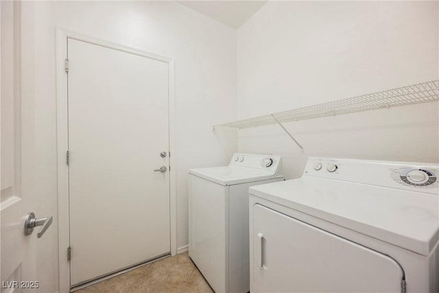 3405 Kingbird Dr, North Las Vegas, NV 89084 - laundry room featuring washing machine and clothes dryer and light tile patterned floors
