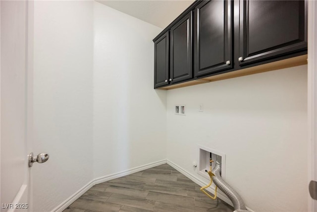 12426 Mosticone Way, Las Vegas, NV 89141 - laundry room with washer hookup, cabinet space, gas dryer hookup, electric dryer hookup, and wood finished floors