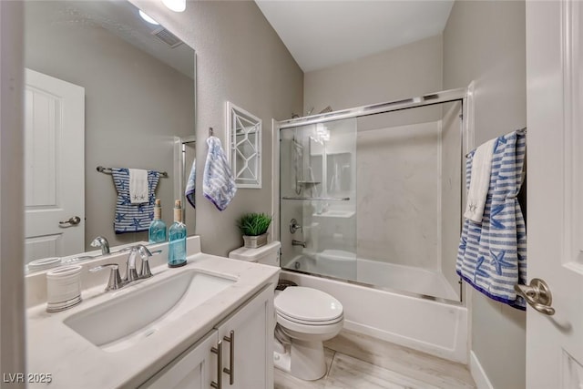 1523 Great Sands St, Boulder City, NV 89005 - bathroom with vanity, enclosed tub / shower combo, and wood finished floors