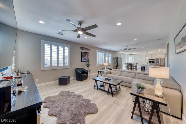 1523 Great Sands St, Boulder City, NV 89005 - living area with a ceiling fan, recessed lighting, light wood finished floors, and healthy amount of natural light