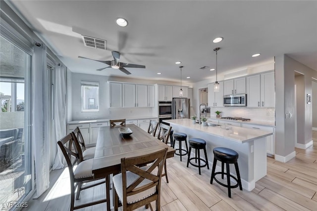 1523 Great Sands St, Boulder City, NV 89005 - dining space featuring ceiling fan, recessed lighting, and light wood-style flooring