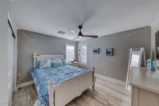 1523 Great Sands St, Boulder City, NV 89005 - bedroom with light wood-style flooring and a ceiling fan