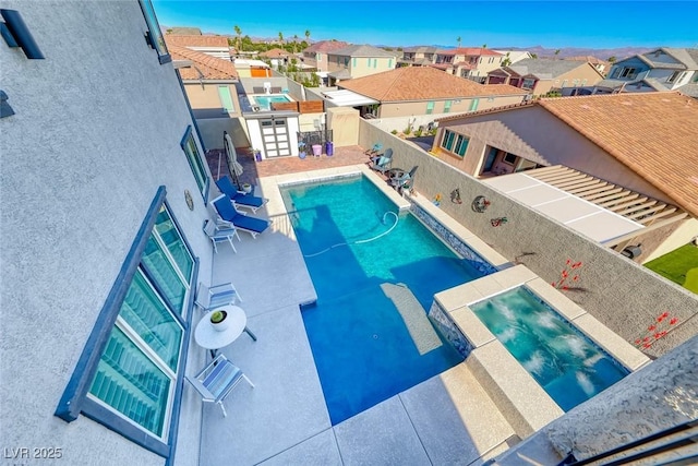 1523 Great Sands St, Boulder City, NV 89005 - view of swimming pool with a residential view, a fenced backyard, a patio, and a pool with connected hot tub