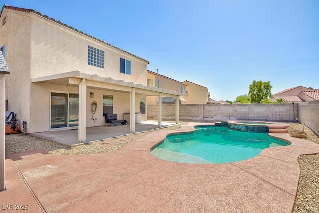 700 Red Bark Ln, Henderson, NV 89011 - view of pool with a patio, a fenced backyard, and a pool with connected hot tub