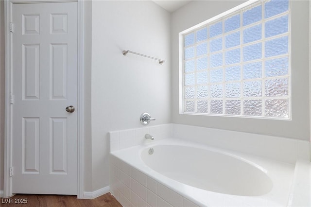 700 Red Bark Ln, Henderson, NV 89011 - full bathroom with a bath, plenty of natural light, and wood finished floors