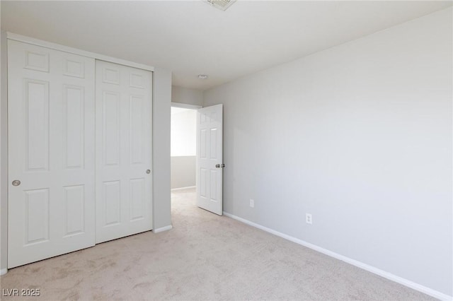 700 Red Bark Ln, Henderson, NV 89011 - unfurnished bedroom featuring carpet flooring and a closet