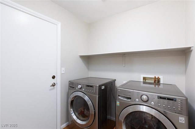 700 Red Bark Ln, Henderson, NV 89011 - laundry area with washing machine and clothes dryer and baseboards