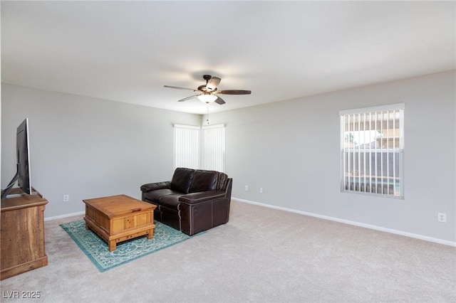 700 Red Bark Ln, Henderson, NV 89011 - carpeted living room featuring a ceiling fan and baseboards