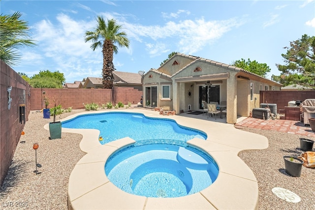 3495 Eagle Bend St, Las Vegas, NV 89122 - view of swimming pool featuring a fenced backyard, a patio, ceiling fan, and a pool with connected hot tub