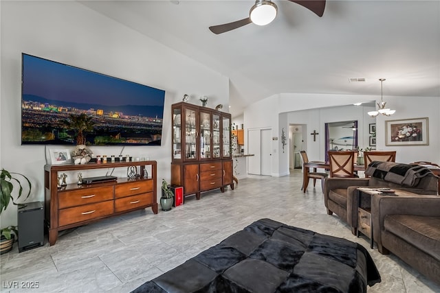 3495 Eagle Bend St, Las Vegas, NV 89122 - living room featuring ceiling fan, vaulted ceiling, and a chandelier