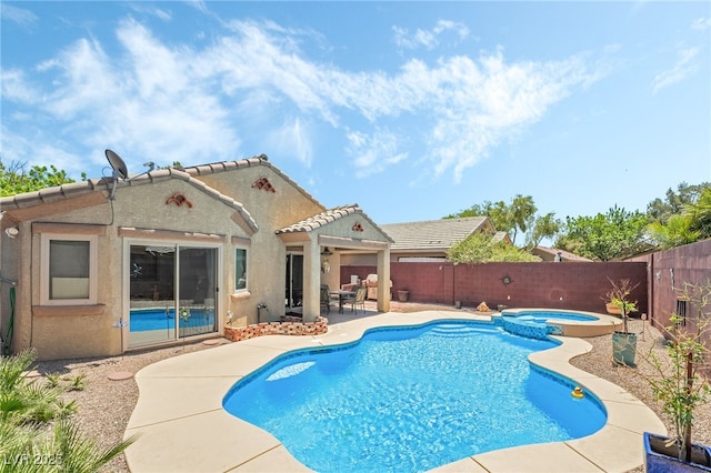 3495 Eagle Bend St, Las Vegas, NV 89122 - view of swimming pool with a patio, a fenced backyard, and a pool with connected hot tub