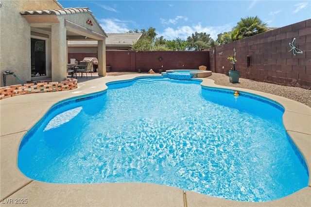 3495 Eagle Bend St, Las Vegas, NV 89122 - view of swimming pool featuring a patio, a fenced backyard, and a pool with connected hot tub