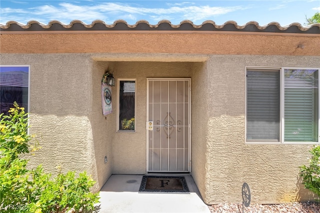 3495 Eagle Bend St, Las Vegas, NV 89122 - property entrance featuring stucco siding