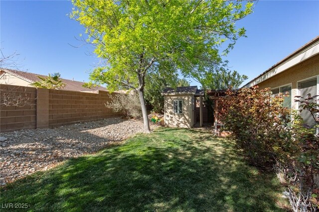 8213 Cabin Springs Ave, Las Vegas, NV 89131 - fenced backyard with a storage unit