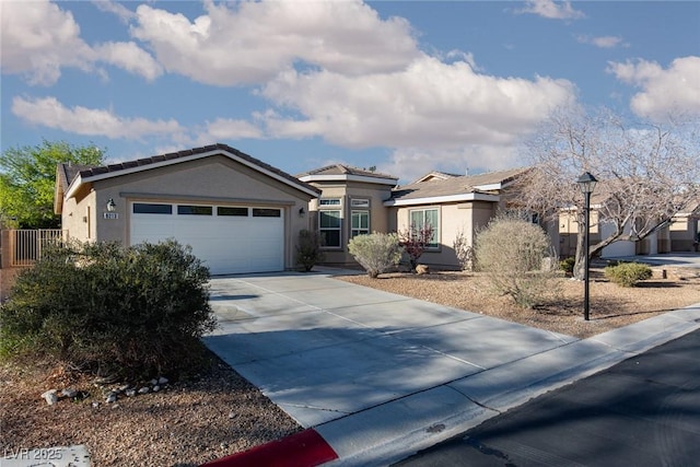 8213 Cabin Springs Ave, Las Vegas, NV 89131 - ranch-style home featuring stucco siding, an attached garage, driveway, and a tiled roof